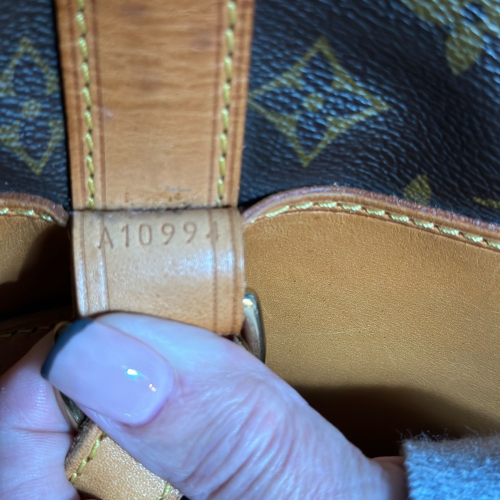 Used but in Good condition Louis Vuitton Monogram Randonnee GM bag.